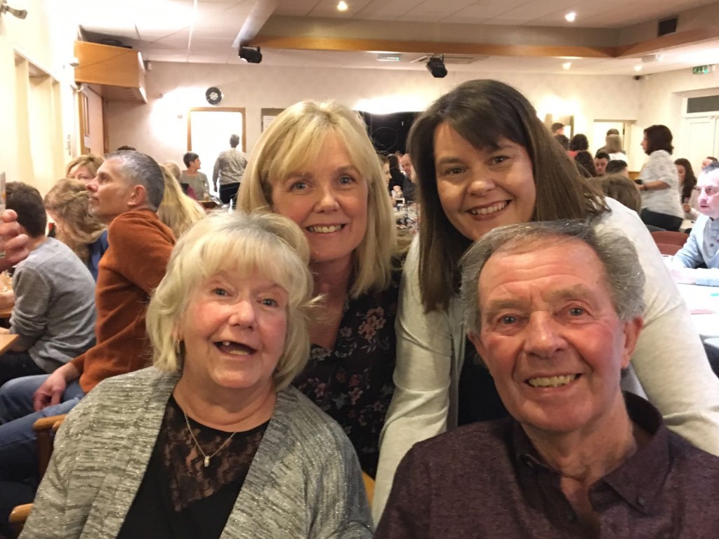 Angie (bottom left) with her husband, Brian and daughters, Tina & Debbie